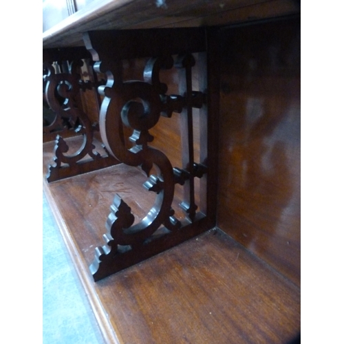 410 - Edwardian glazed three-door bookcase fixed to a converted base.