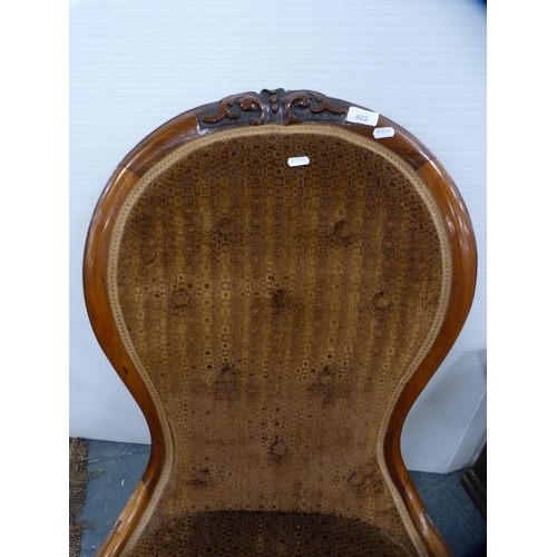 422 - Victorian walnut lady's spoon-back chair with later upholstery.