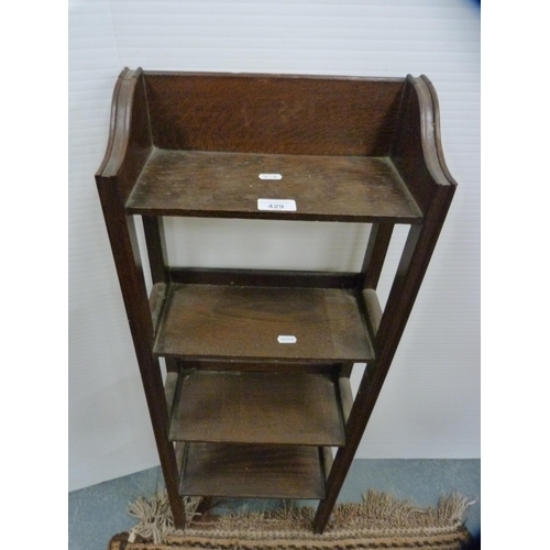 429 - Small oak open bookcase.