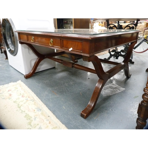 450 - Reproduction coffee table with glass top.