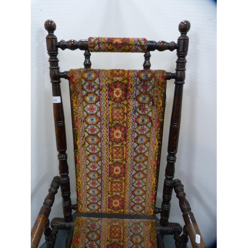 459 - American mahogany rocking chair.