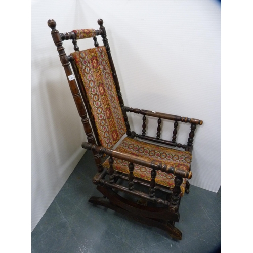 459 - American mahogany rocking chair.