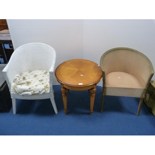 486 - Two woven fibre tub chairs and a modern oval occasional table.  (3)