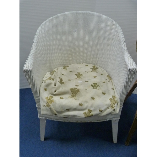 486 - Two woven fibre tub chairs and a modern oval occasional table.  (3)