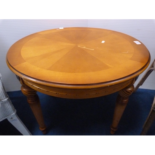 486 - Two woven fibre tub chairs and a modern oval occasional table.  (3)