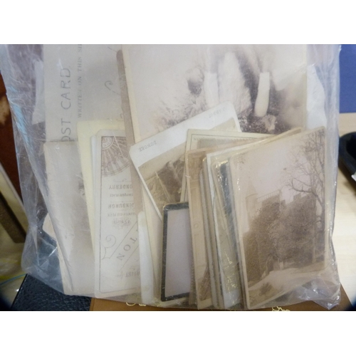 50 - Assorted antique and later postcards, portrait photographs, stamps and ephemera.