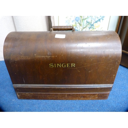 7 - Portable Singer sewing machine.