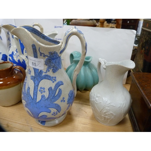 85 - Group of Victorian Glasgow-style jugs, Victorian relief decorated jugs, water jug with pewter lid et... 