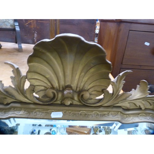 201 - Victorian-style gilt wall mirror.