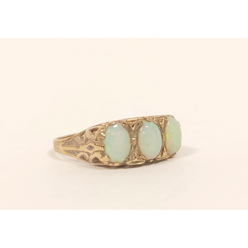 42 - Opal three stone ring in 9ct gold. Size R½ 2.9g