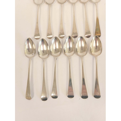 58 - Set of twelve silver tea spoons and tongs, initialled by Mary and Elizabeth Sharpe, 1830, 225g, 7oz.