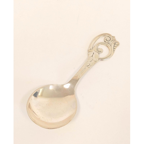 65 - Silver caddy spoon of love spoon style, W H Haseler, Birmingham 1911 and another Danish 1941.