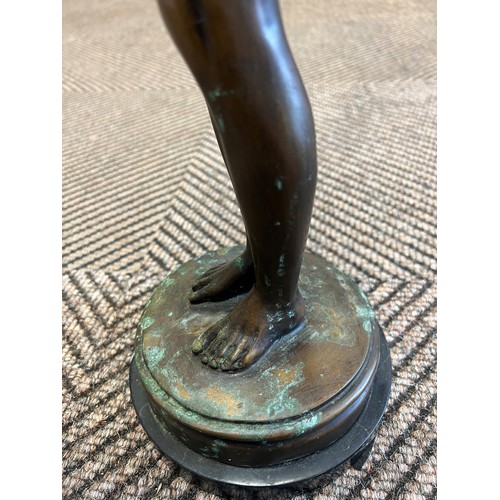 292 - 1920's Bronze figure of an archer, unsigned, mounted to a black marble base, height 61cm