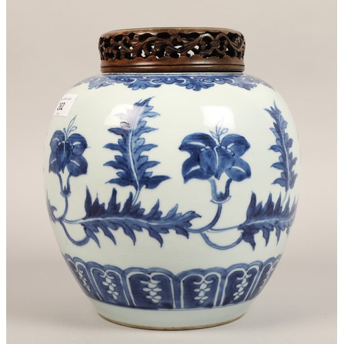 262 - 19th century Chinese blue and white ginger jar, with carved hardwood cover, the jar decorated with a... 