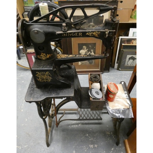 Singer antique industrial treadle sewing machine for use with leather.
