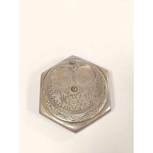 168 - Antique white metal and resin pocket snuff box, the engraved hexagonal revolving top in the form of ... 