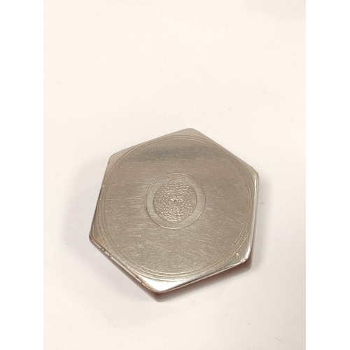 168 - Antique white metal and resin pocket snuff box, the engraved hexagonal revolving top in the form of ... 