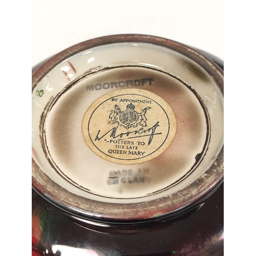 309 - Moorcroft flambe tube lined cylindrical powder jar with cover, stamped & with original label to ... 