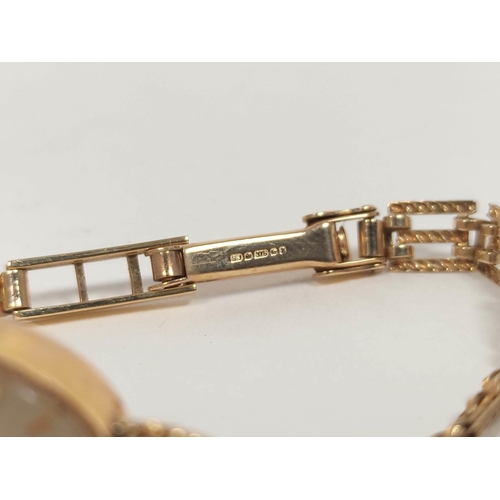 69 - Lady's H Samuel 9ct gold bracelet watch with two spare links. 6g without movement.