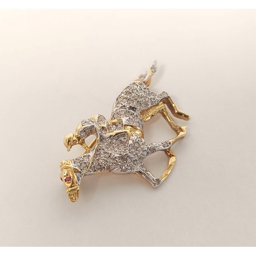 75 - 9ct gold racehorse and jockey brooch set with eight-cut diamonds. 6.6g