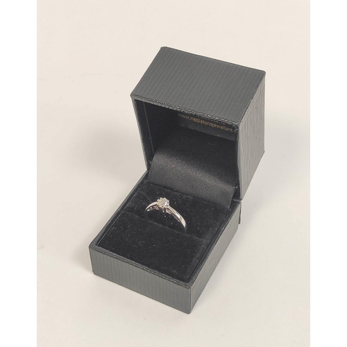 81 - Diamond solitaire ring in 18ct white gold. Size 'K' 2.1g.