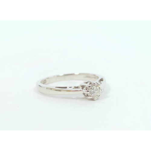 81 - Diamond solitaire ring in 18ct white gold. Size 'K' 2.1g.