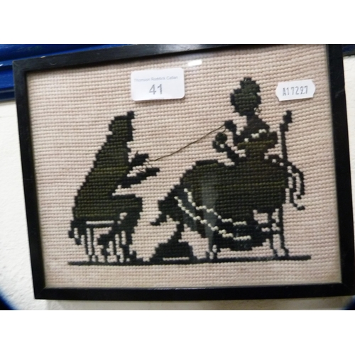 63 - Regency-style silhouette embroidery of a couple, in black slip frame.