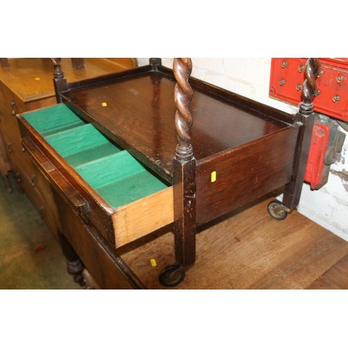 772 - Oak two tier trolley with sectional drawer and presentation plaque, 73cm high.