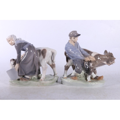 158 - Two Royal Copenhagen figure groups to include Milking Maid #779 and Boy and Calf #772.