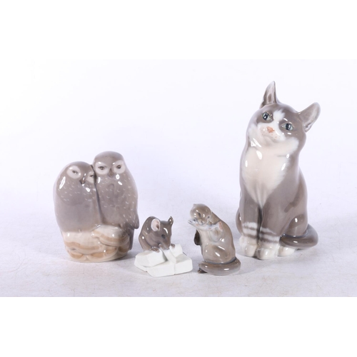 164 - Group of Royal Copenhagen animal models to include Otter #2333, Cat #1803, Owl group #834 and anothe... 