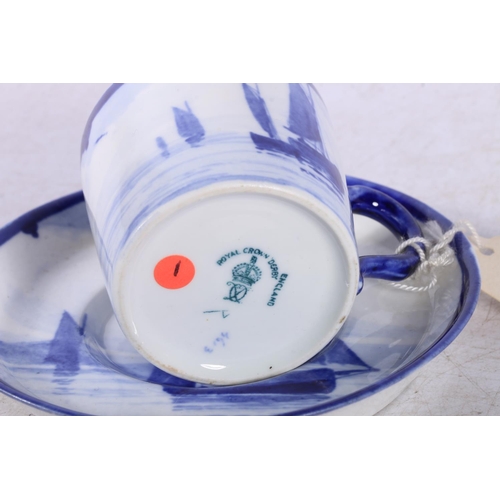 166 - Royal Crown Derby blue and white coffee cup and saucer, depicting sailing ships.