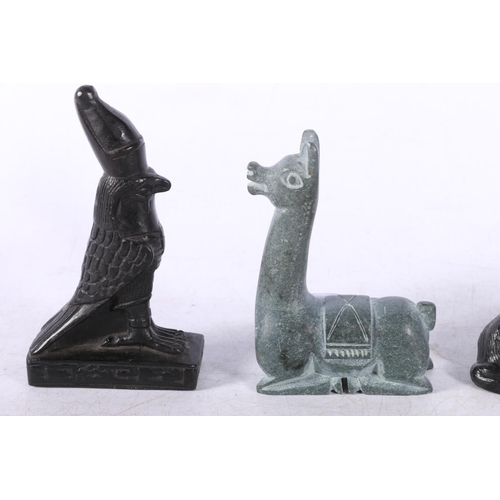 173 - Four models to include Bronzed dog, soapstone Lama, Rhino and another (4).