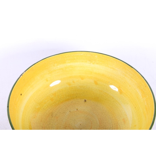 179 - Wemyss Jazzy pattern bowl with yellow glaze interior, Wemyss 218 to the base.