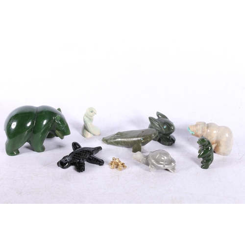 183 - Carved jade bear and fish, onyx bear and fish and other small figures.