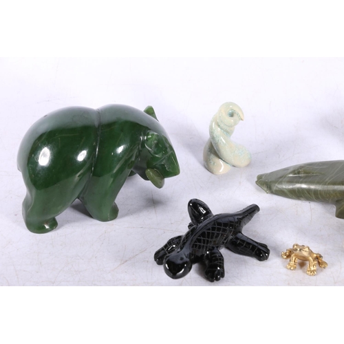 183 - Carved jade bear and fish, onyx bear and fish and other small figures.