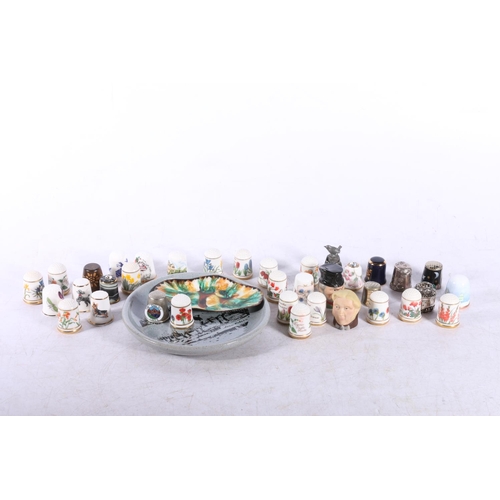 184 - Group of ceramic thimbles.