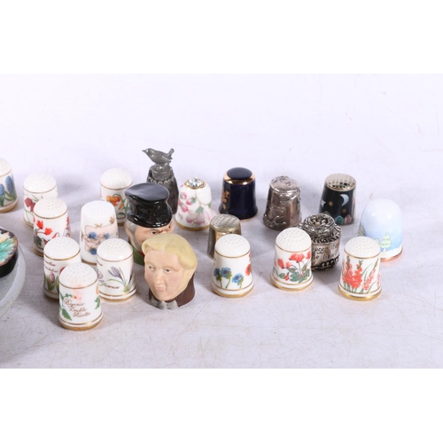 184 - Group of ceramic thimbles.