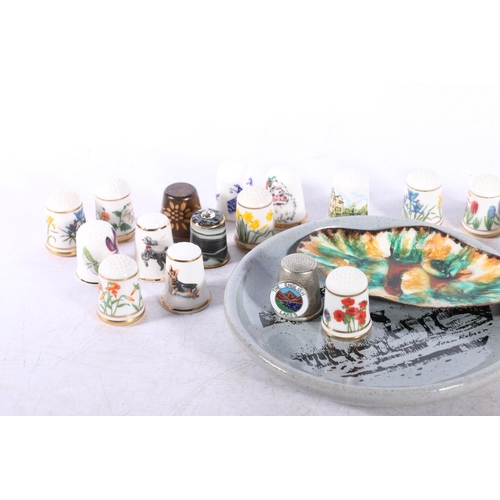 184 - Group of ceramic thimbles.