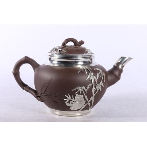 202 - Chinese Yixing and silver plate teapot with oriental marks to the base.