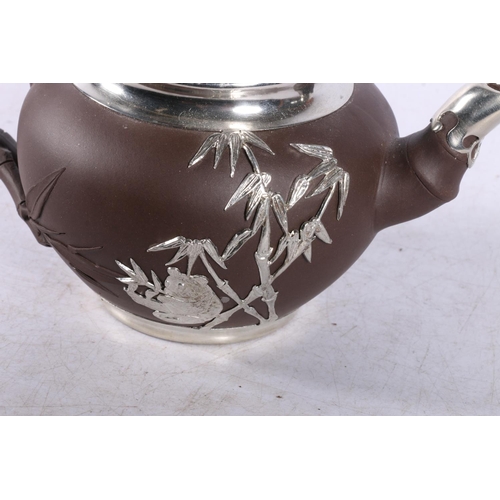 202 - Chinese Yixing and silver plate teapot with oriental marks to the base.