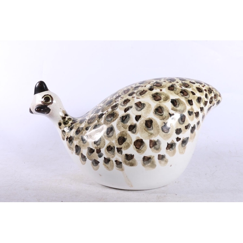 206 - Stoneware Pottery bird model with makers mark to the base.