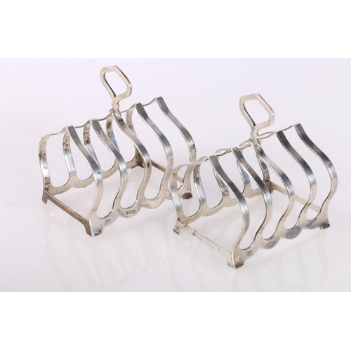 680 - Pair of silver five bar toastracks by William Suckling Limited,  Birmingham 1920/1945, 126g gro... 