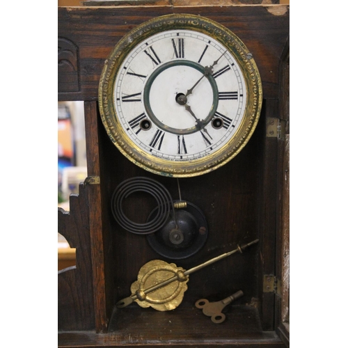 742 - Waterbury Clock Co of USA gingerbread clock, 56cm high.