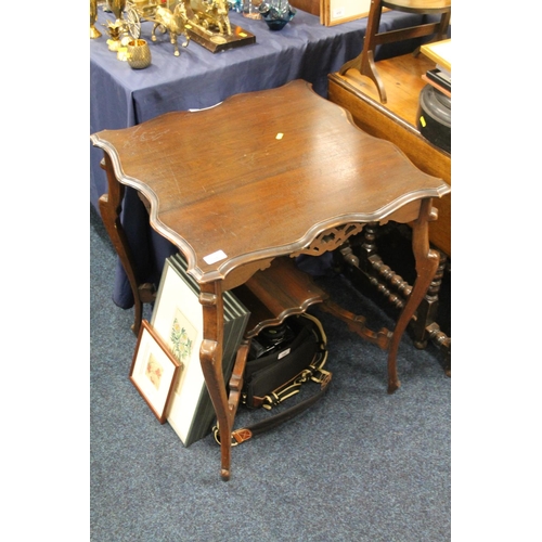 751 - Mahogany two tier window table with shaped top, 68cm high.