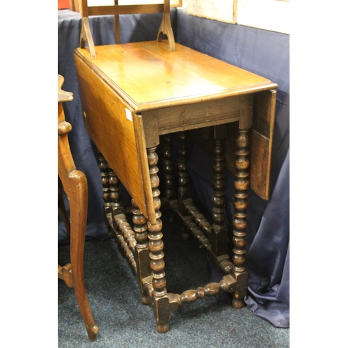 753 - Antique oak gate leg table on bobbin style turned supports, 67cm high.