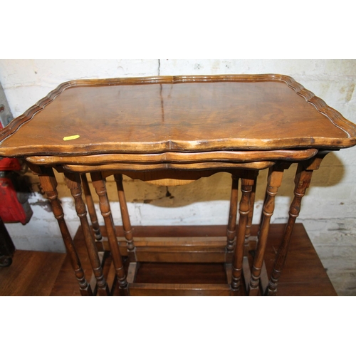 769 - Reproduction mahogany nest of three tables, largest measures 55cm wide.