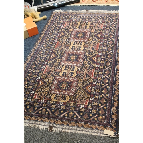 795 - Shirvan style rug with multiple border and geometric decoration, 191cm x 109cm.