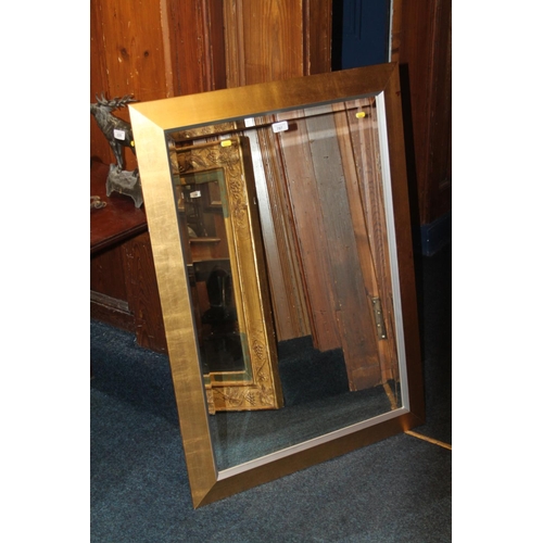 797 - Rectangular gilt framed wall mirror, 106cm x 76cm.