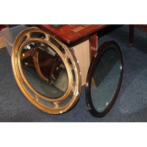 802 - 19th fentury oval gilt framed sectional mirror, 90cm x 66cm.