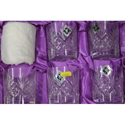 230 - Two boxed sets of six Edinburgh Crystal glasses.